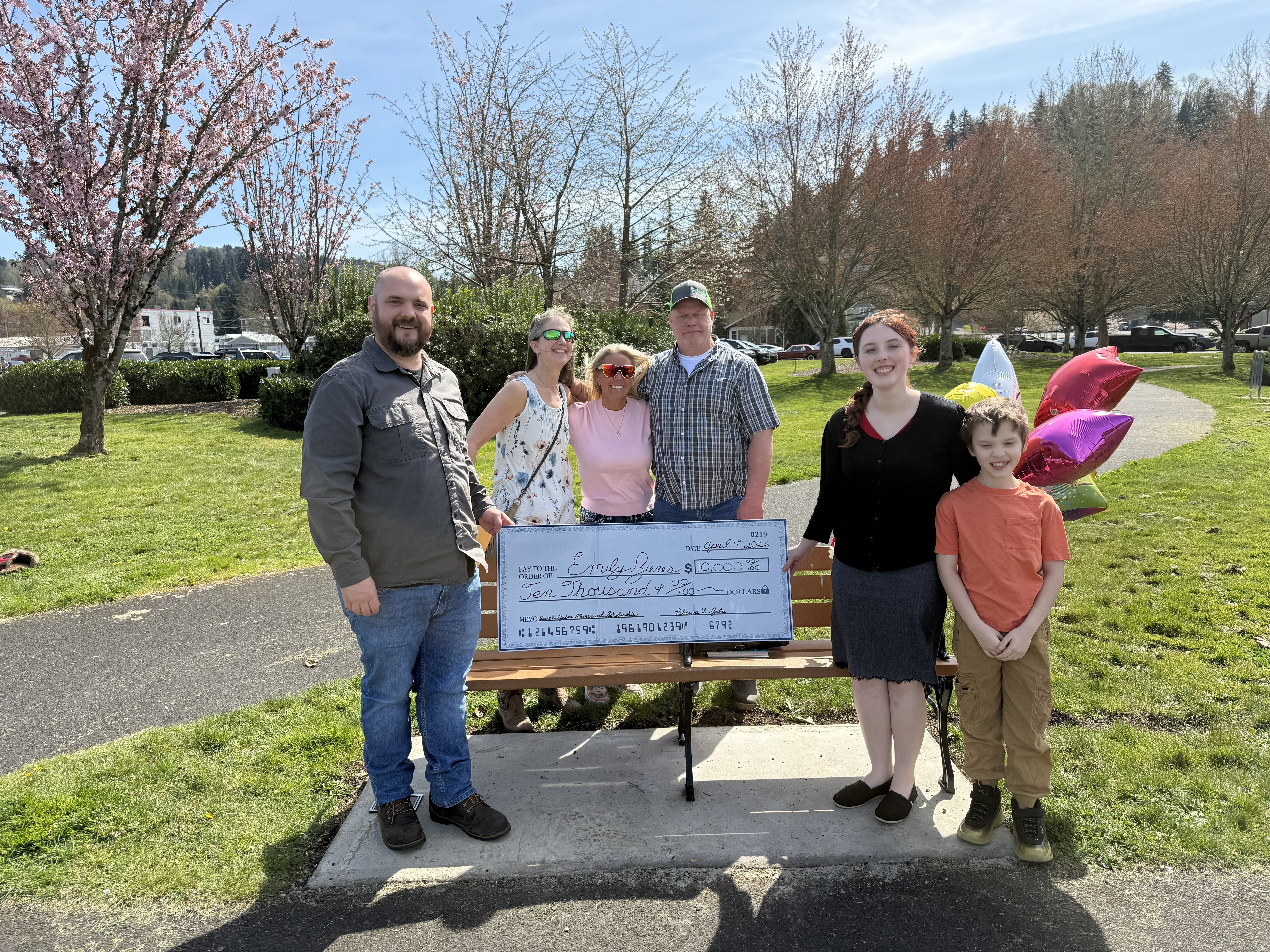 Scholarship celebration group photo featuring Emily and finalists